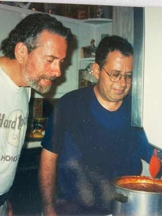 Two men cooking
